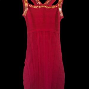 Bebe red dress with gold accents. Size XS